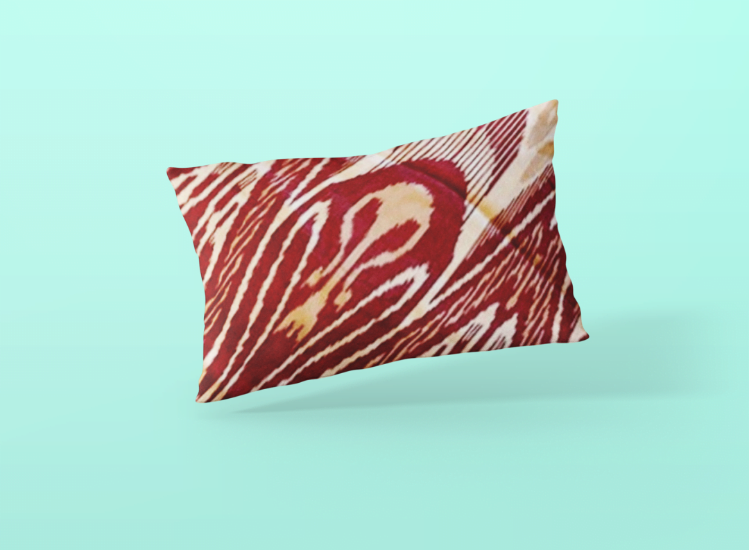 sublimated pillow mockup leaning against a solid background 698 el 2